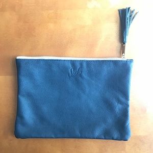 Sseko Designs Black Pebbled Leather tassel clutch